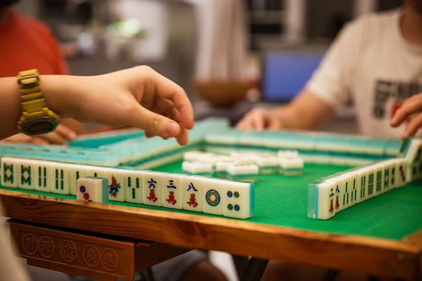 Mahjong fans in Sichuan jam tables again as restriction lifted